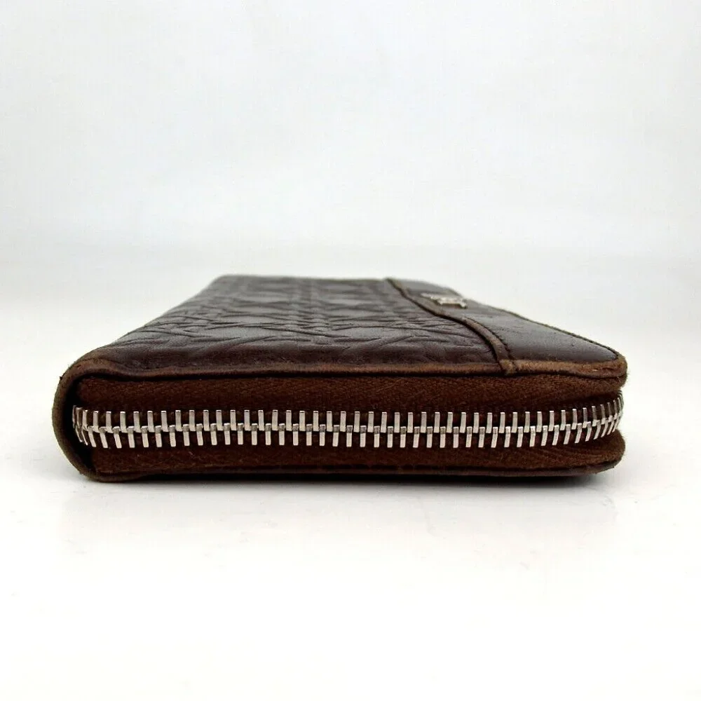 Authentic Christian Dior Cannage-embossed zip-around purse leather [Used]